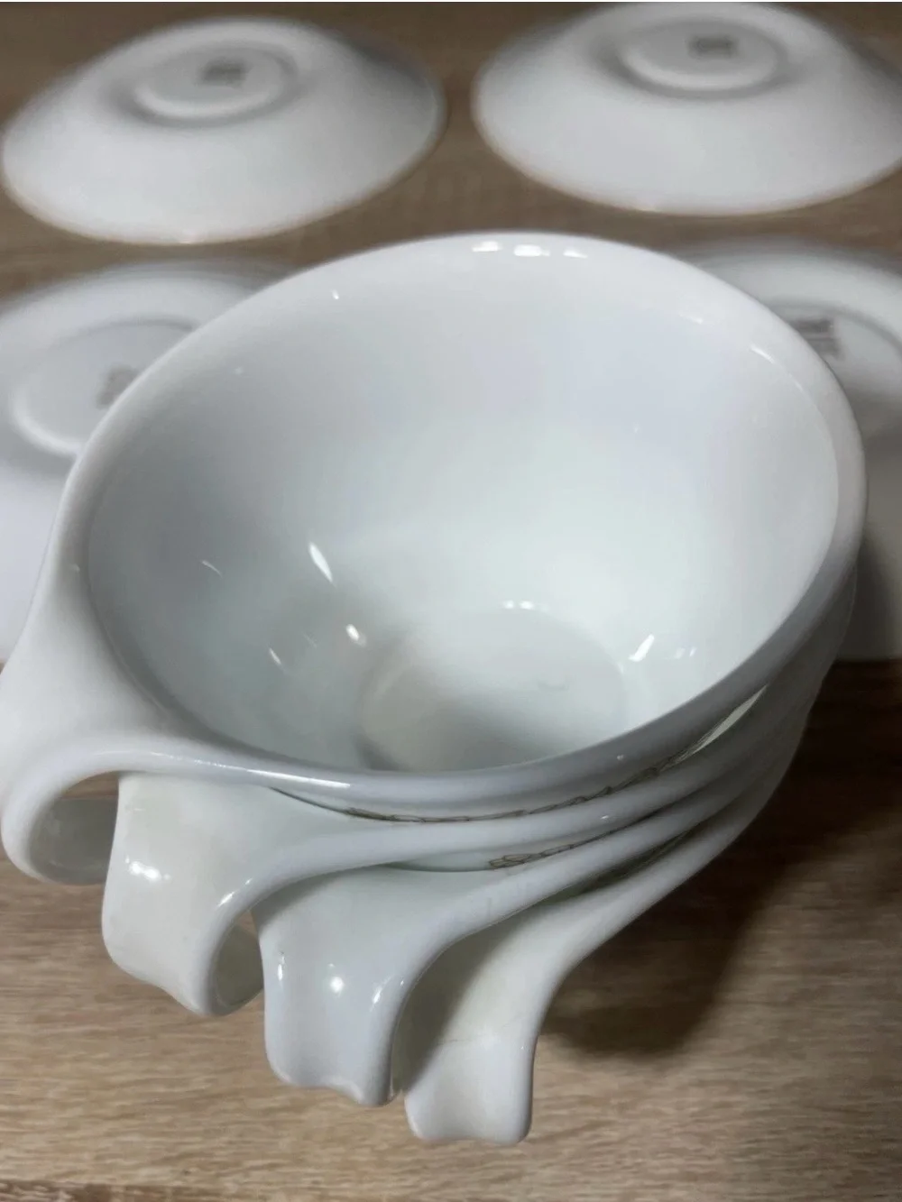 Set of (4) corelle pyrex coffe cups with saucers “woodland ” hook handles